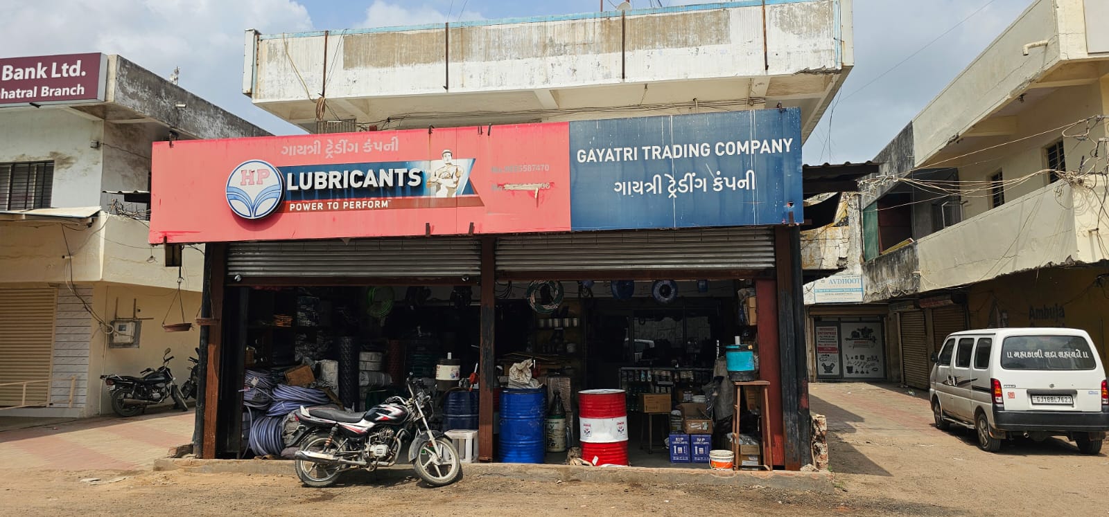 Gayatri Trading Company storefront and signboard in Chhatral, Gujarat