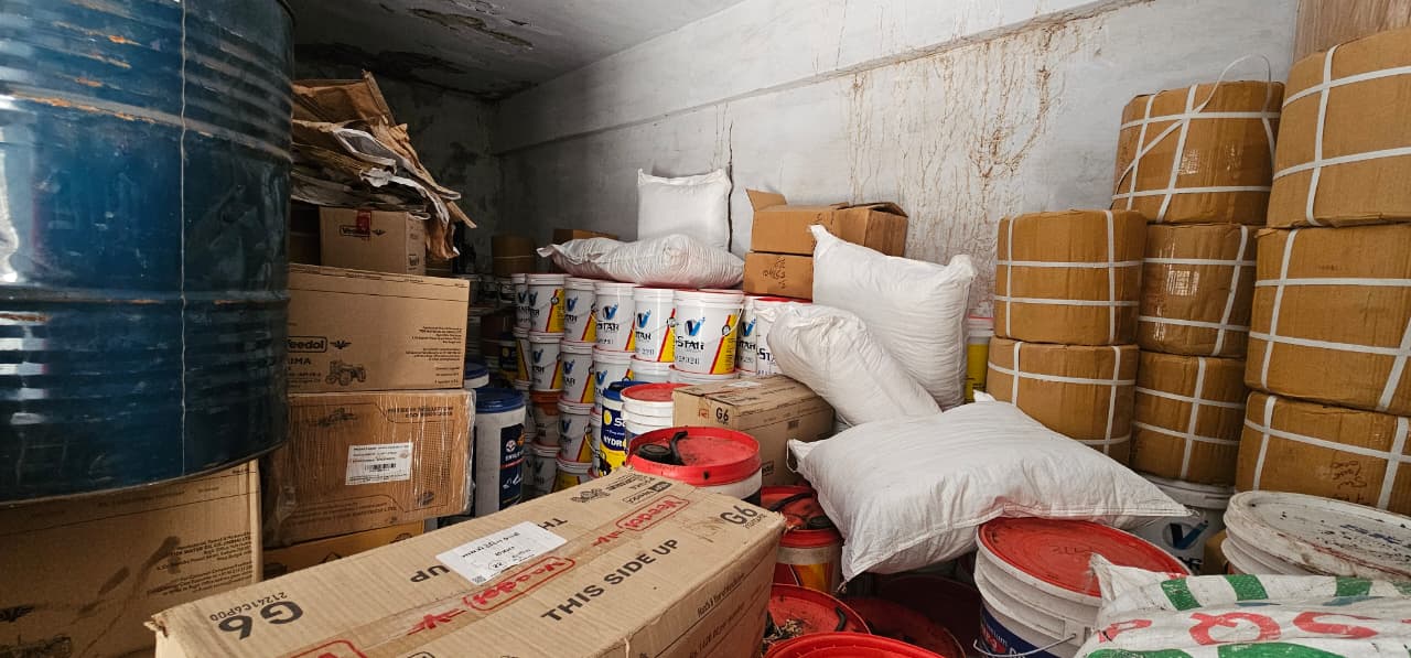 Stock of oils, greases and packed industrial goods in the store